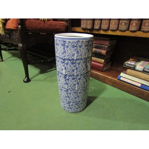 4143 - A ceramic cylindrical blue and white stick/umbrella stand, 44cm tall