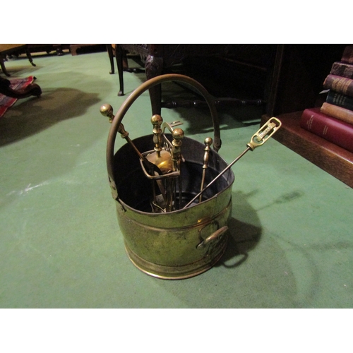 4145 - A brass coal bucket with associated brass fire tools