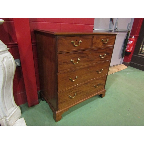 4149 - A George III mahogany chest of two short over three graduating long drawers with brass swan neck han... 