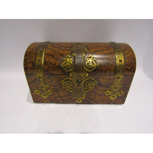 4160 - A Victorian burr walnut domed top brass bound tea caddy with Bramah lock, 