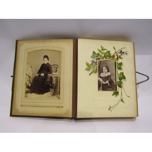 4162 - A Victorian album containing Cartes de Visite and cabinet card portrait photographs, mainly Norwich ... 