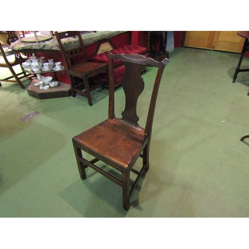 4163 - Attributed to East Anglia 1780-1830 an oak side chair with vasiform splat over a flat seat on chamfe... 