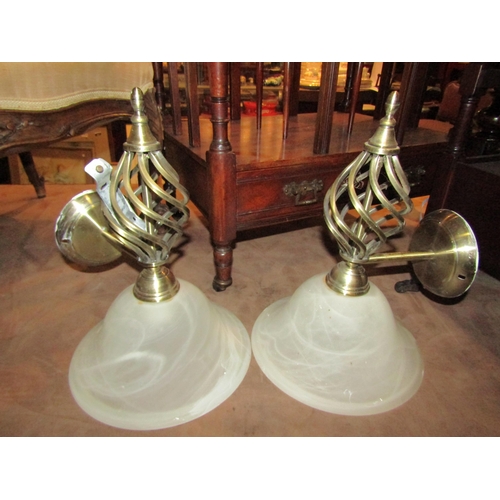 4198 - A pair of modern wall lights with spiral finials