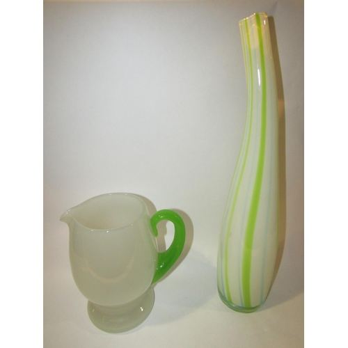 4225 - A studio glass vase, 44cm height, and a mid-century frosted glass jug with uranium glass handle (2)