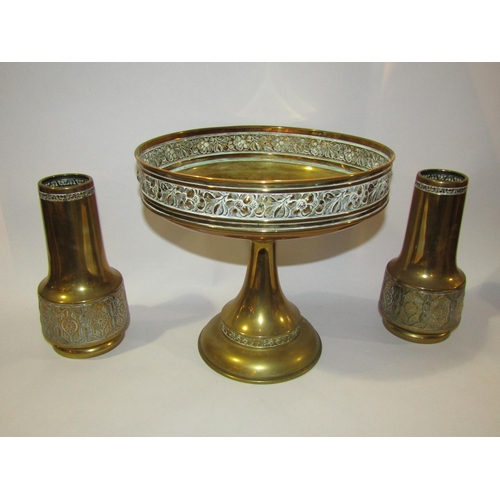 4264 - A brass comport 24cm tall, and a pair of brass embossed baluster form vases, 20cm tall (3)