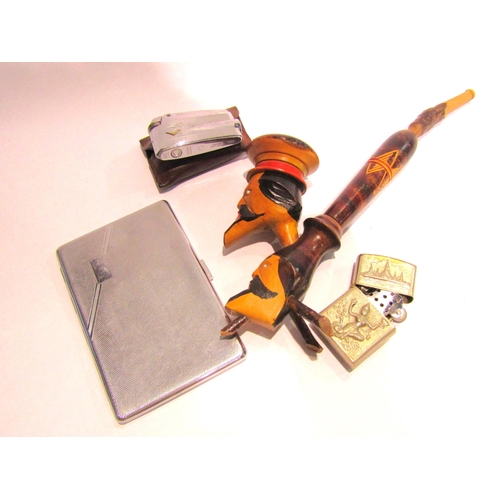 4289 - A bag of smoking related items, chrome cigarette case, lighters, continental pipe