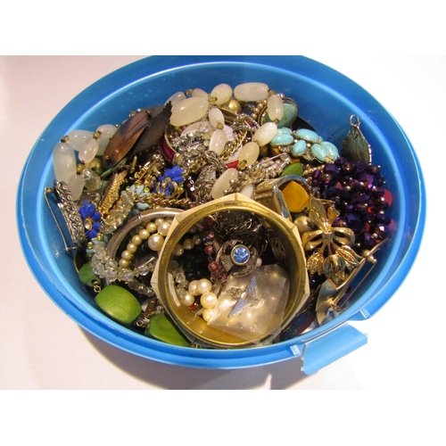 4298 - Three tubs of assorted costume jewellery