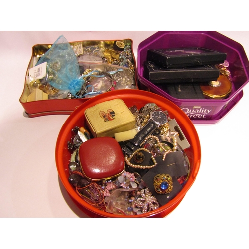 4310 - Three tubs of assorted costume jewellery