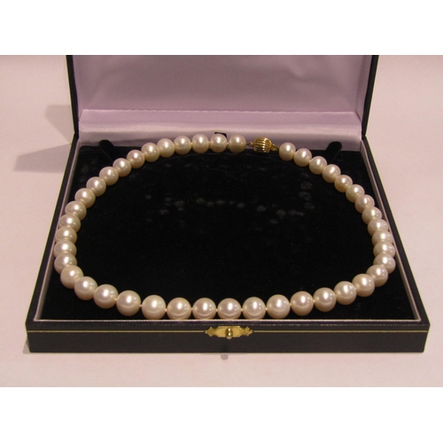 4333 - A single strand pearl necklace with clasp stamped 375, boxed