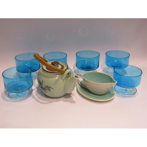 4358 - A set of six 1970's teal coloured glass pudding dishes, a Poole two tone sauce boat and an Oriental ... 