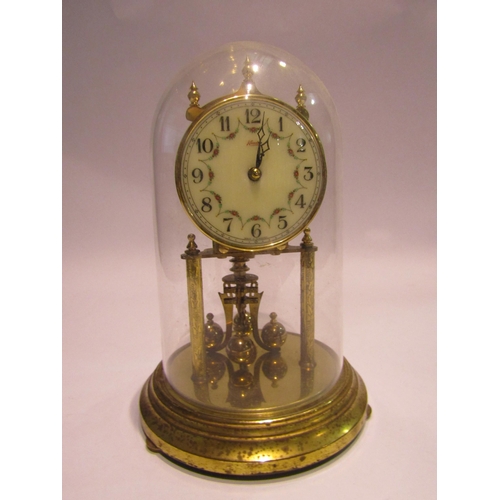 4371 - A 'Kundo' anniversary clock (30lbs) numerations, flowers and swag chapter ring