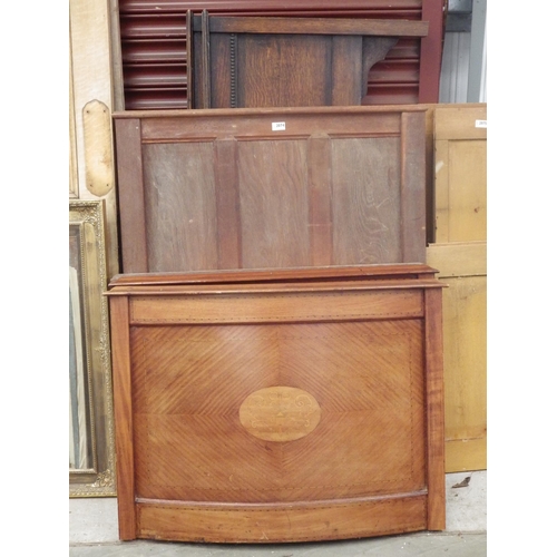 2075 - A quantity of oak and mahogany bed ends, four Victorian scumble pine panels