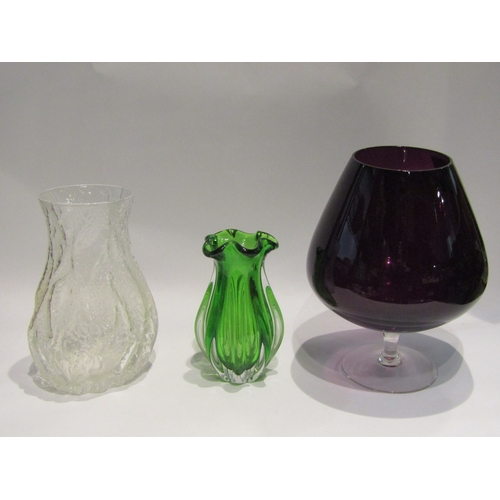 4384 - A retro amethyst coloured oversized glass and two studio glass vases, 29cm, 25cm and 18cm tall (3)