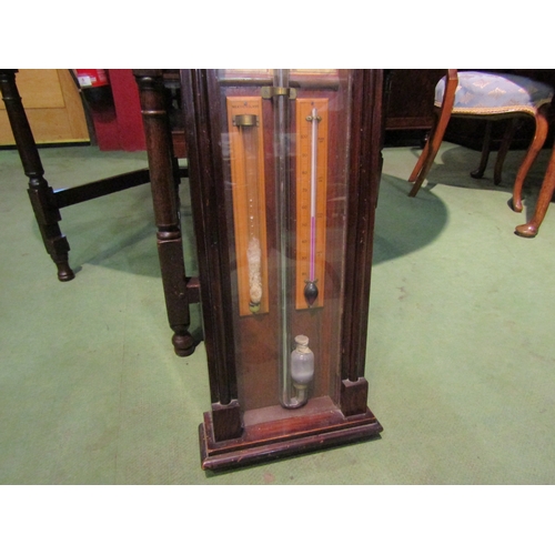 4037 - An Admiral Fitzroy barometer in Gothic style case, 128cm tall