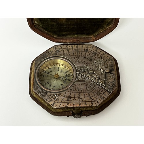 5187 - MICHAEL BUTTERFIELD OF PARIS: A circa 1680-1700 silver pocket sundial, octagonal form with multiple ... 