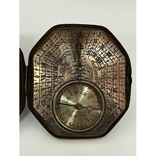 5187 - MICHAEL BUTTERFIELD OF PARIS: A circa 1680-1700 silver pocket sundial, octagonal form with multiple ... 