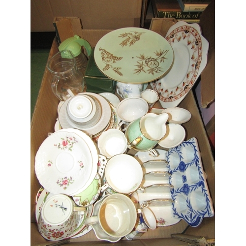 4405 - Two boxes containing a collection of teacups and saucers, a metal teapot, two cake stands, a bakelit... 