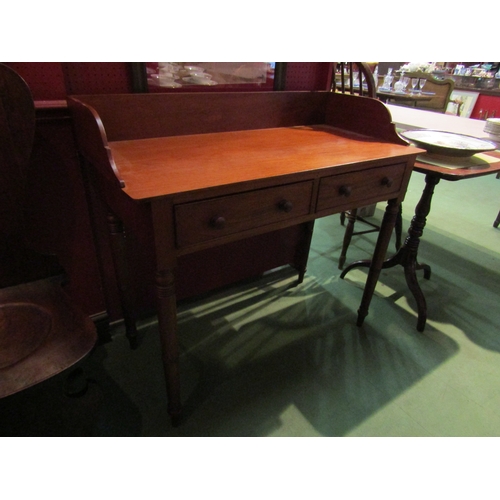 4056 - A Victorian mahogany washstand, the three quarter raised back over two frieze drawers on ring turned... 