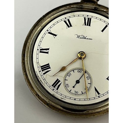 5141 - A Waltham USA silver open-faced keyless wind pocket watch, white enamel Roman numerated dial with su... 