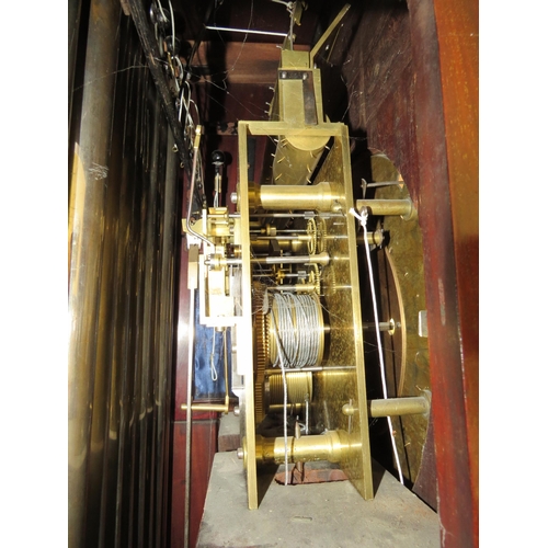 8001 - A Victorian carved oak Gothic style chiming longcase clock, attributed to J.J. Elliot. The hood with... 