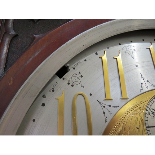 8001 - A Victorian carved oak Gothic style chiming longcase clock, attributed to J.J. Elliot. The hood with... 