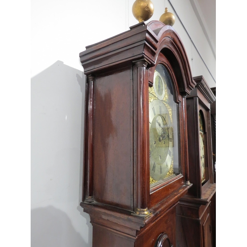 8004 - A mahogany longcase clock by Benjamin Lockwood of Swaffham, the ornate brass dial with silvered Roma... 