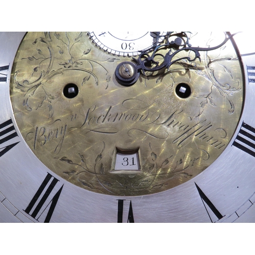 8004 - A mahogany longcase clock by Benjamin Lockwood of Swaffham, the ornate brass dial with silvered Roma... 