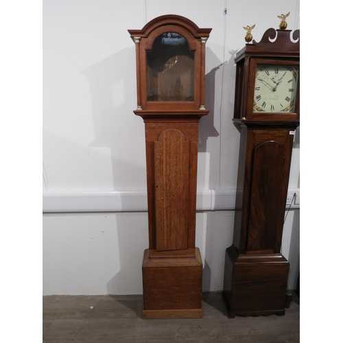 8006 - An oak longcase clock by Benjamin Sudlow of Yarmouth, ornate dial with silvered Roman chapter ring, ... 