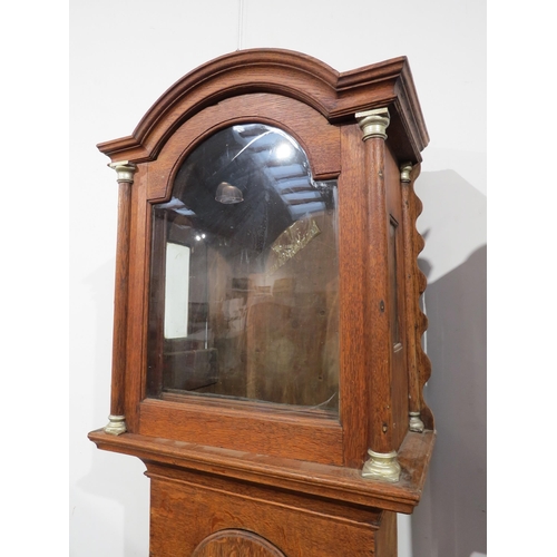 8006 - An oak longcase clock by Benjamin Sudlow of Yarmouth, ornate dial with silvered Roman chapter ring, ... 