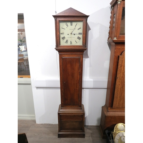 8007 - A oak cased longcase clock by Reid & Sons, Newcastle on Tyne, white Roman numeral dial with moon sty... 