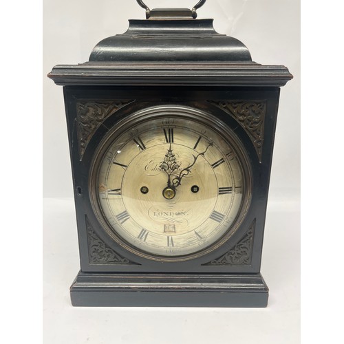 5002 - EDWARD CLARKE OF LONDON: A George III ebonised cased bracket clock, the silvered engraved convex dia... 