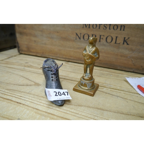 2416 - A brass figure of a bear holding shield with Masonic symbol and a 19th Century pewter shoe pin cushi... 