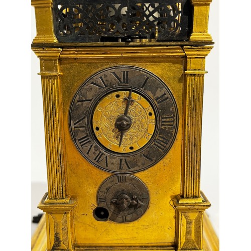 5021 - A mid-17th Century Tabernacle form gilt brass striking and alarm table clock, case possibly German, ... 