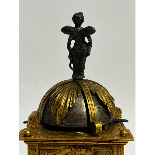 5022 - An early 17th Century German engraved gilt brass striking tabernacle style clock. The winged figure ... 