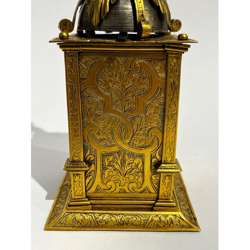 5022 - An early 17th Century German engraved gilt brass striking tabernacle style clock. The winged figure ... 