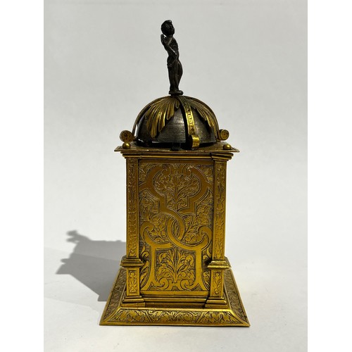 5022 - An early 17th Century German engraved gilt brass striking tabernacle style clock. The winged figure ... 