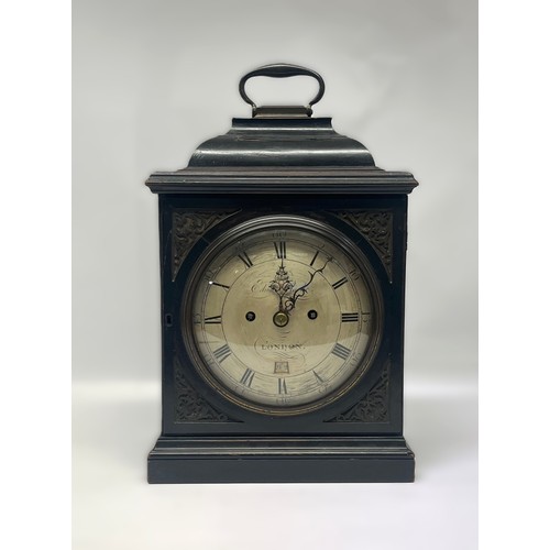 5002 - EDWARD CLARKE OF LONDON: A George III ebonised cased bracket clock, the silvered engraved convex dia... 