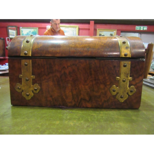 4160 - A Victorian burr walnut domed top brass bound tea caddy with Bramah lock, 