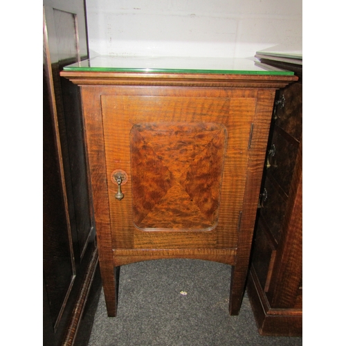 1006 - An early 20th Century sideboard, two drawers over two cupboard doors (one handle missing), 83cm tall... 