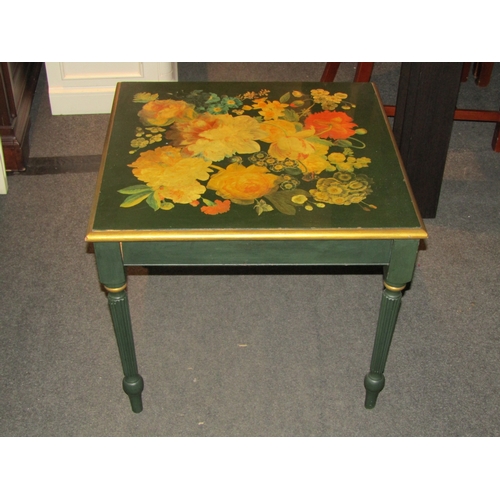 1035 - A green and gilt painted side table with floral design, 48cm tall x 58cm wide