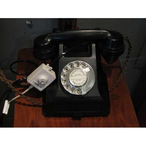 1077 - An Art Deco two-tier table/standard lamp, chrome fitting, together with a retro dial telephone