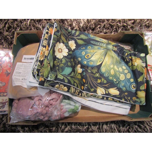 1105 - A box containing various cushion covers in mainly velveteen fabrics, different designs and colours