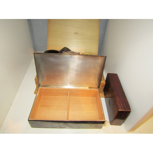 1252 - A wooden box containing a Tasmanian Myrtle wood perpetual 40 year calendar, lidded boxes including a... 