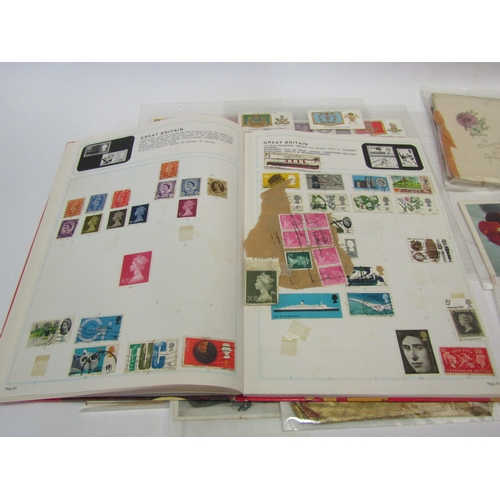 1290 - A stamp album containing some worldwide stamps, a set of Players Cap badges, cigarette cards. drums,... 