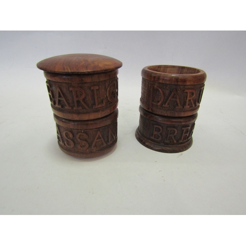 1338 - A hardwood sectional tea canister set to include 