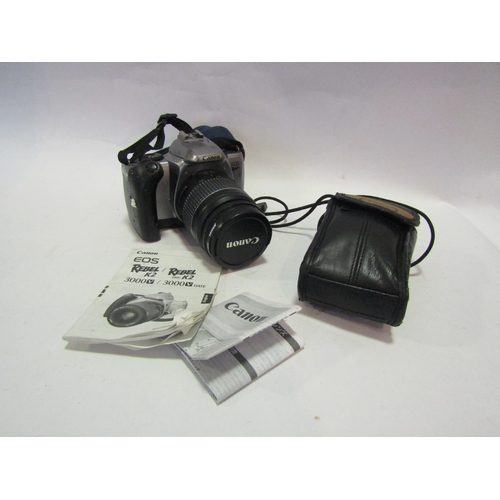 1397 - A cased Canon ESO Rebel K2 w/ Canon zoom lens EF 28-80mm f3.5-5.6 II lens & a Canon SureShot 60 zoom... 