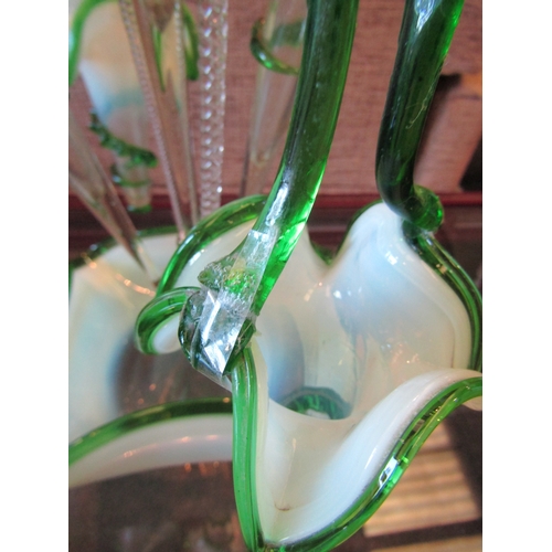 1016 - A Victorian green edged glass epergne, one trumpet a/f, 53cm tall