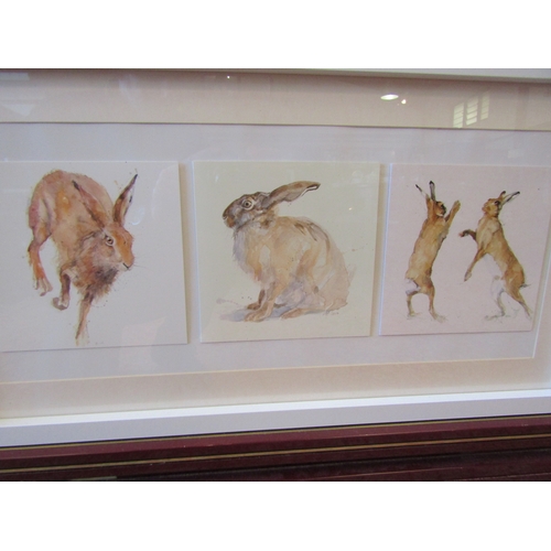 1082 - A set of three hare prints, framed and glazed as one