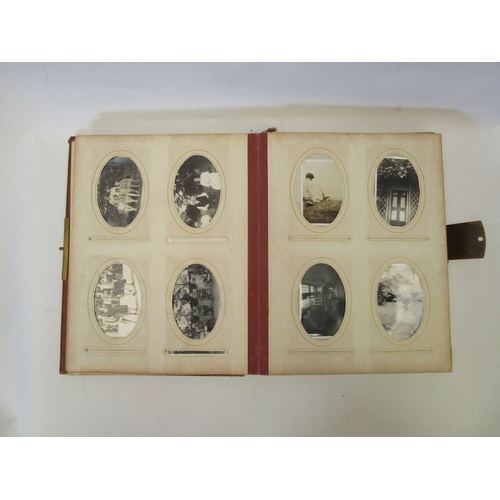 1344 - A Victorian photograph album containing domestic Edwardian and Victorian photographs, spine a/f