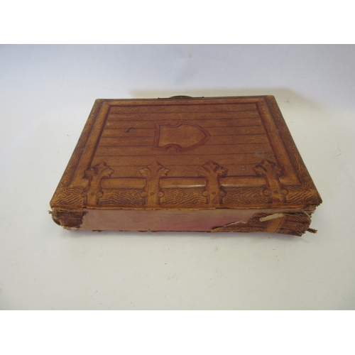 1344 - A Victorian photograph album containing domestic Edwardian and Victorian photographs, spine a/f